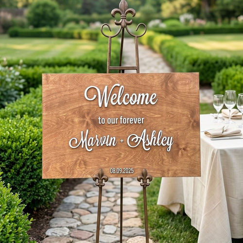 Wooden wedding welcome sign on an easel in a garden