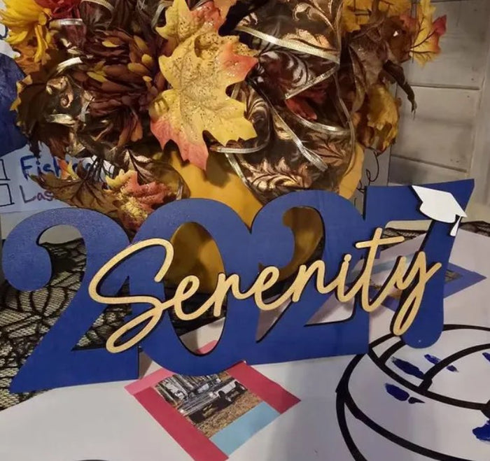 Blue and gold 2027 graduation sign with the name Serenity